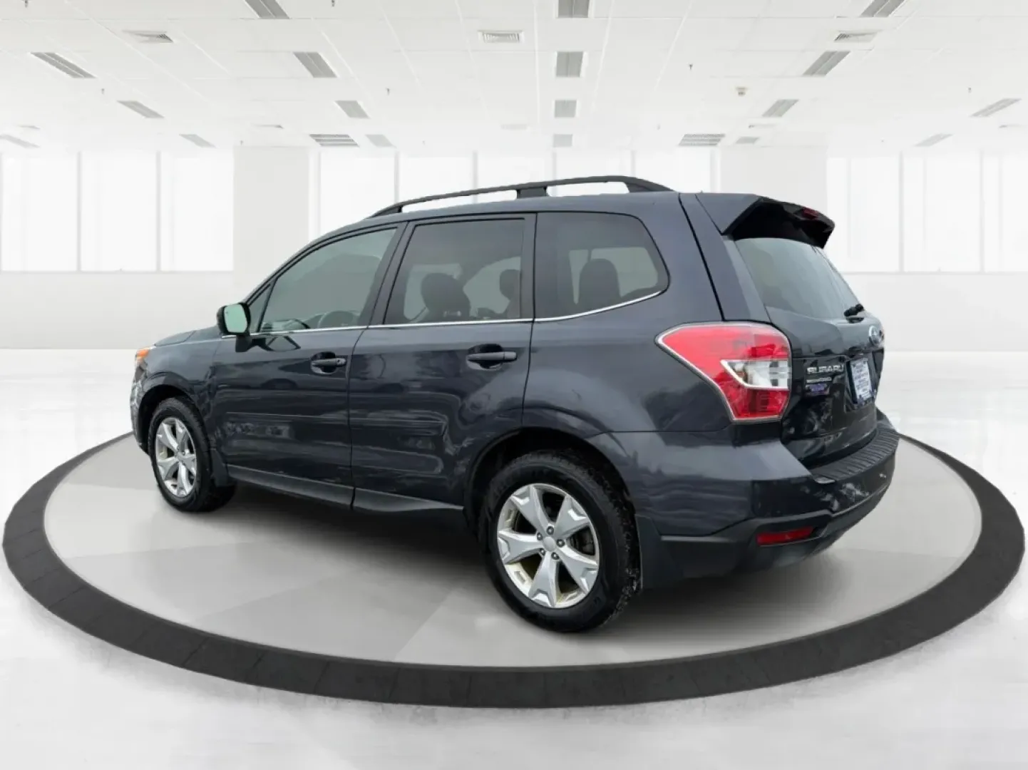 2015 Subaru Forester 2.5i Limited (JF2SJAKC0FH) with an 2.5L H-4 DOHC engine, 6-Speed Automatic transmission, located at 1184 Kauffman Ave, Fairborn, OH, 45324, (937) 908-9800, 39.807072, -84.030914 - Unleash your adventures with the 2015 Subaru Forester 2.5i Limited, a versatile SUV perfect for budget-conscious buyers seeking style, comfort, and capability. Whether you're planning weekend getaways in nearby Yellow Springs or commuting through Fairborn's bustling streets, this vehicle is designed - Photo#4