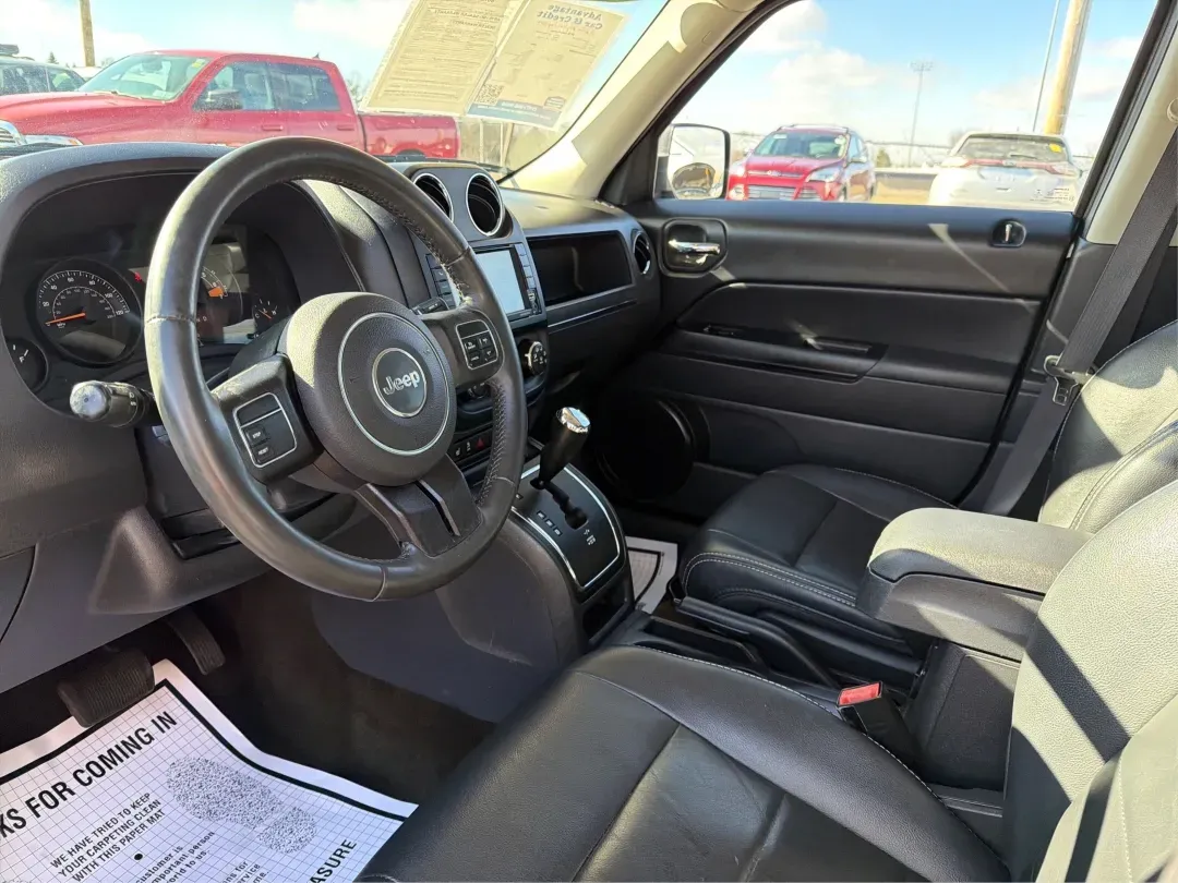 2016 Jeep Patriot High Altitude Edition (1C4NJRFB2GD) with an 2.4L I-4 DOHC engine, located at 401 Woodman Dr, Riverside, OH, 45431, (937) 908-9800, 39.760899, -84.123421 - 2016 Jeep Patriot High Altitude Edition - Photo#9