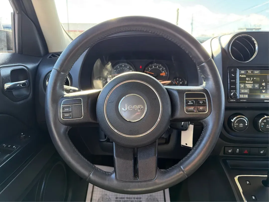 2016 Jeep Patriot High Altitude Edition (1C4NJRFB2GD) with an 2.4L I-4 DOHC engine, located at 401 Woodman Dr, Riverside, OH, 45431, (937) 908-9800, 39.760899, -84.123421 - 2016 Jeep Patriot High Altitude Edition - Photo#16