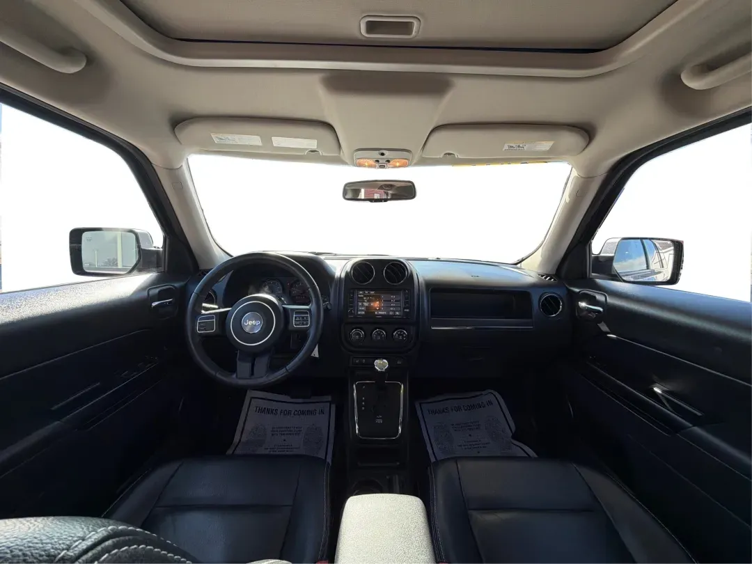 2016 Jeep Patriot High Altitude Edition (1C4NJRFB2GD) with an 2.4L I-4 DOHC engine, located at 401 Woodman Dr, Riverside, OH, 45431, (937) 908-9800, 39.760899, -84.123421 - 2016 Jeep Patriot High Altitude Edition - Photo#21