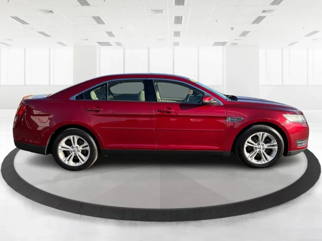 2014 Ford Taurus SEL (1FAHP2E85EG) with an EcoBoost 2L I-4 gasoline direct injection engine, located at 1230 East Main St, Xenia, OH, 45385, (937) 908-9800, 39.688026, -83.910172 - 2014 Ford Taurus SEL - Photo#1