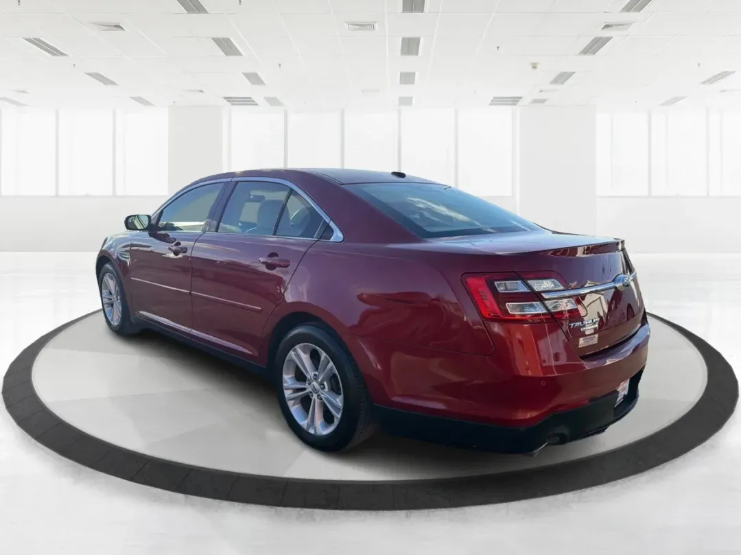 2014 Ford Taurus SEL (1FAHP2E85EG) with an EcoBoost 2L I-4 gasoline direct injection engine, located at 1230 East Main St, Xenia, OH, 45385, (937) 908-9800, 39.688026, -83.910172 - 2014 Ford Taurus SEL - Photo#4