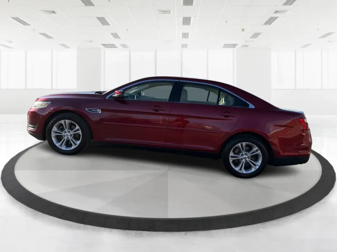 2014 Ford Taurus SEL (1FAHP2E85EG) with an EcoBoost 2L I-4 gasoline direct injection engine, located at 1230 East Main St, Xenia, OH, 45385, (937) 908-9800, 39.688026, -83.910172 - 2014 Ford Taurus SEL - Photo#5
