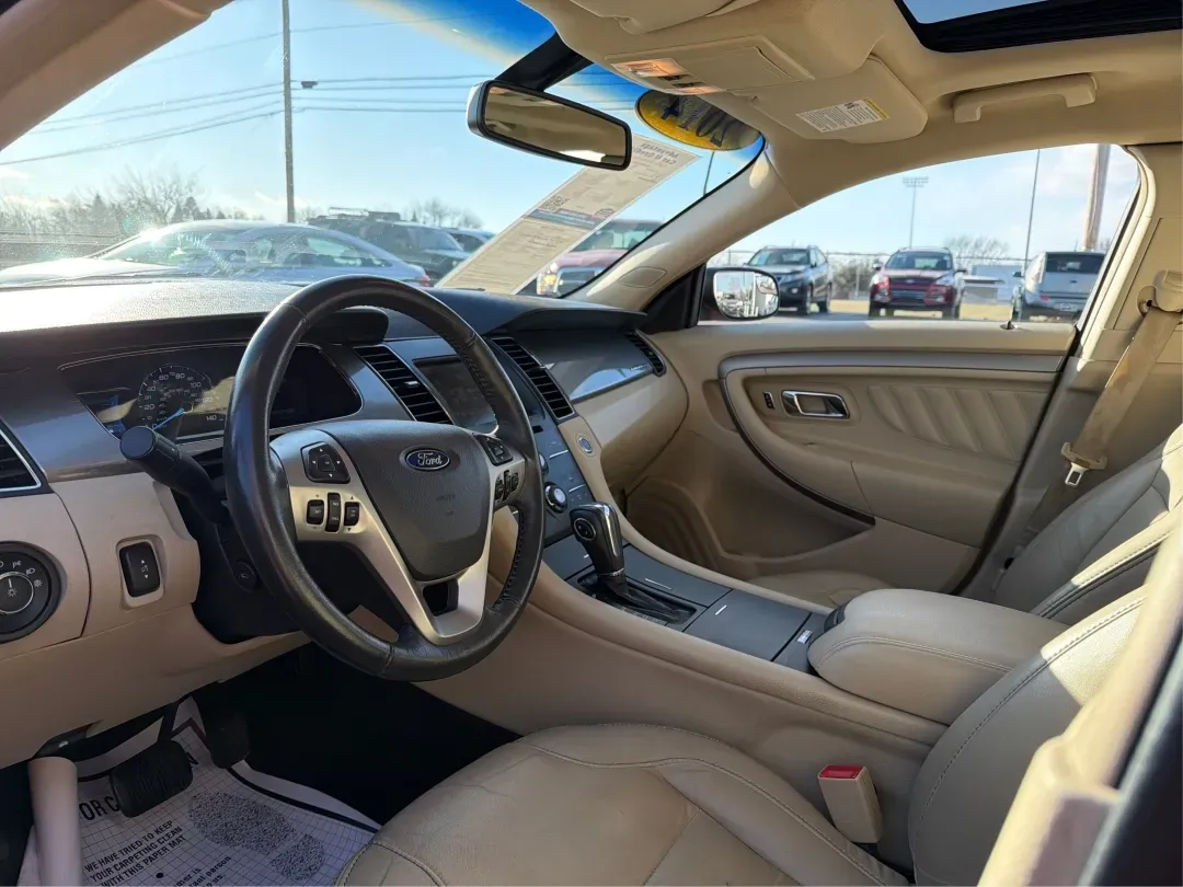 2014 Ford Taurus SEL (1FAHP2E85EG) with an EcoBoost 2L I-4 gasoline direct injection engine, located at 1230 East Main St, Xenia, OH, 45385, (937) 908-9800, 39.688026, -83.910172 - 2014 Ford Taurus SEL - Photo#9