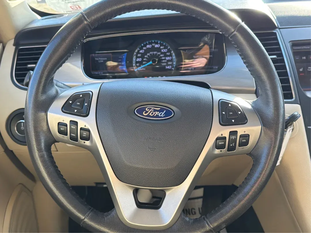 2014 Ford Taurus SEL (1FAHP2E85EG) with an EcoBoost 2L I-4 gasoline direct injection engine, located at 1230 East Main St, Xenia, OH, 45385, (937) 908-9800, 39.688026, -83.910172 - 2014 Ford Taurus SEL - Photo#16