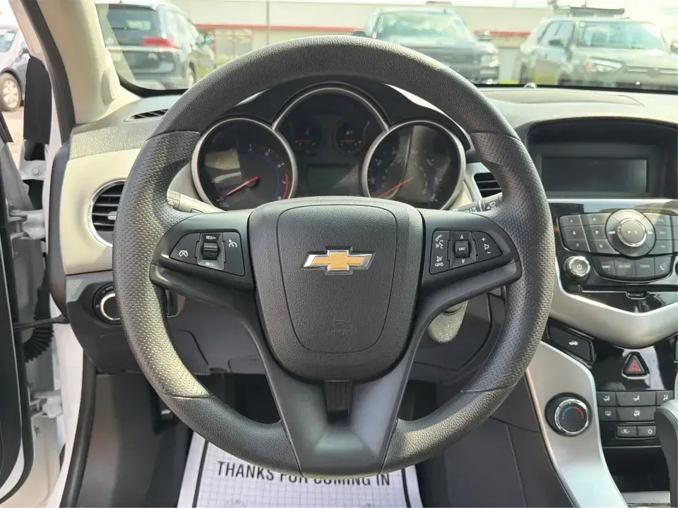 2015 Chevrolet Cruze LS Auto (1G1PA5SH8F7) with an 1.8L L4 DOHC 16V FFV engine, 6-Speed Automatic transmission, located at 8750 N County Rd 25A, Piqua, OH, 45356, (937) 908-9800, 40.164391, -84.232513 - Need a dependable commuter that keeps your weekdays simple and your weekends open? This 2015 Chevrolet Cruze LS Auto in Summit White is a smart pick for drivers who want an efficient sedan for the daily run up I75, errands around Piqua, or quick trips to Troy, Sidney, and Dayton-without giving up co- Photo#16