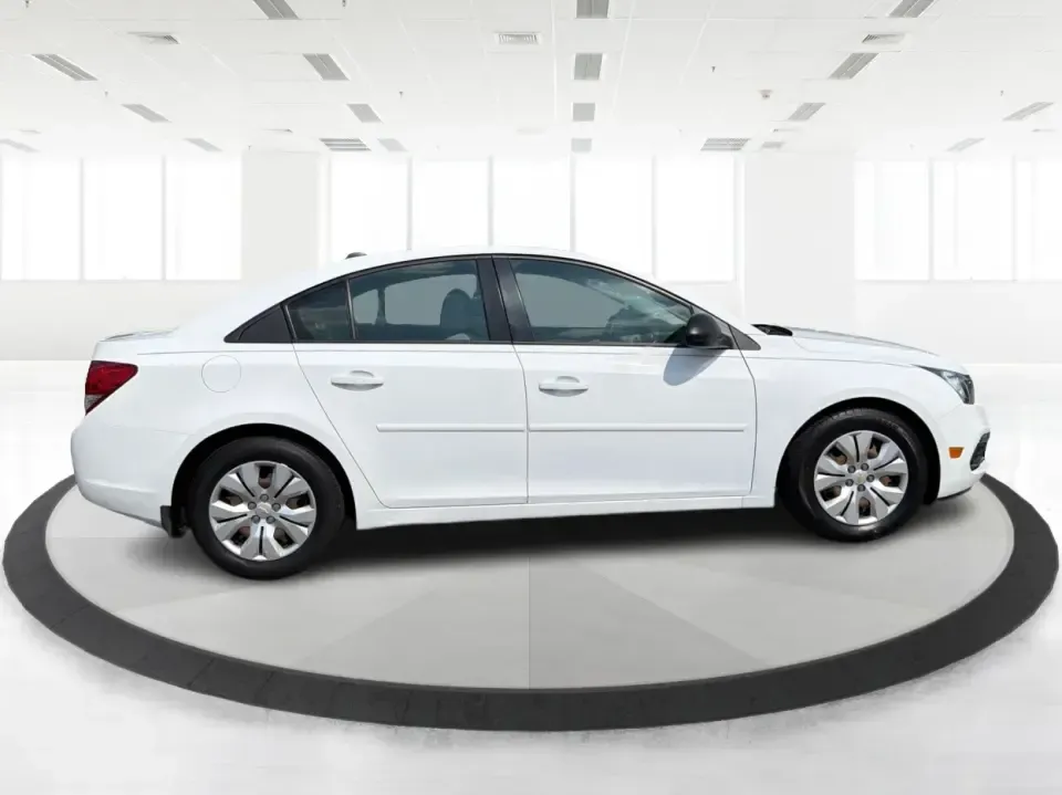 2015 Chevrolet Cruze LS Auto (1G1PA5SH8F7) with an 1.8L L4 DOHC 16V FFV engine, 6-Speed Automatic transmission, located at 1099 N County Rd 25A , Troy, OH, 45373, (937) 908-9800, 40.057079, -84.212883 - Need a smart, budget-friendly commuter that can handle the daily drive from Troy to Dayton, school drop-offs, and the occasional weekend run to The Greene or a day at Troy's Strawberry Festival? This 2015 Chevrolet Cruze LS Auto is built for real life-easy to park downtown near the Square, efficient- Photo#1