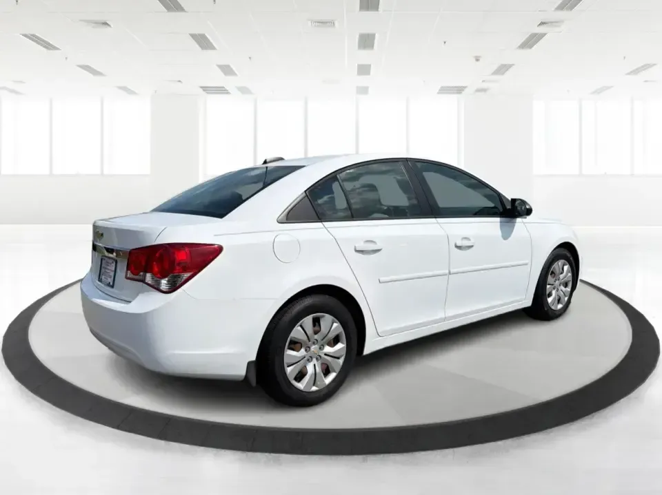 2015 Chevrolet Cruze LS Auto (1G1PA5SH8F7) with an 1.8L L4 DOHC 16V FFV engine, 6-Speed Automatic transmission, located at 1099 N County Rd 25A , Troy, OH, 45373, (937) 908-9800, 40.057079, -84.212883 - Need a smart, budget-friendly commuter that can handle the daily drive from Troy to Dayton, school drop-offs, and the occasional weekend run to The Greene or a day at Troy's Strawberry Festival? This 2015 Chevrolet Cruze LS Auto is built for real life-easy to park downtown near the Square, efficient- Photo#2