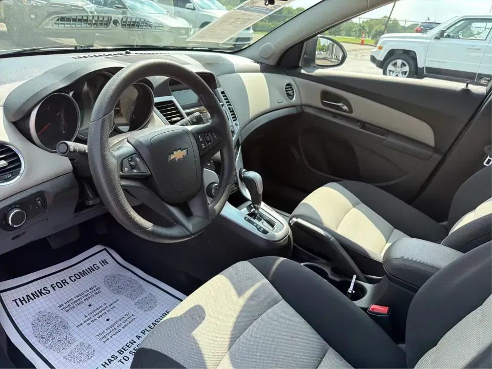 2015 Chevrolet Cruze LS Auto (1G1PA5SH8F7) with an 1.8L L4 DOHC 16V FFV engine, 6-Speed Automatic transmission, located at 1099 N County Rd 25A , Troy, OH, 45373, (937) 908-9800, 40.057079, -84.212883 - Need a smart, budget-friendly commuter that can handle the daily drive from Troy to Dayton, school drop-offs, and the occasional weekend run to The Greene or a day at Troy's Strawberry Festival? This 2015 Chevrolet Cruze LS Auto is built for real life-easy to park downtown near the Square, efficient- Photo#9
