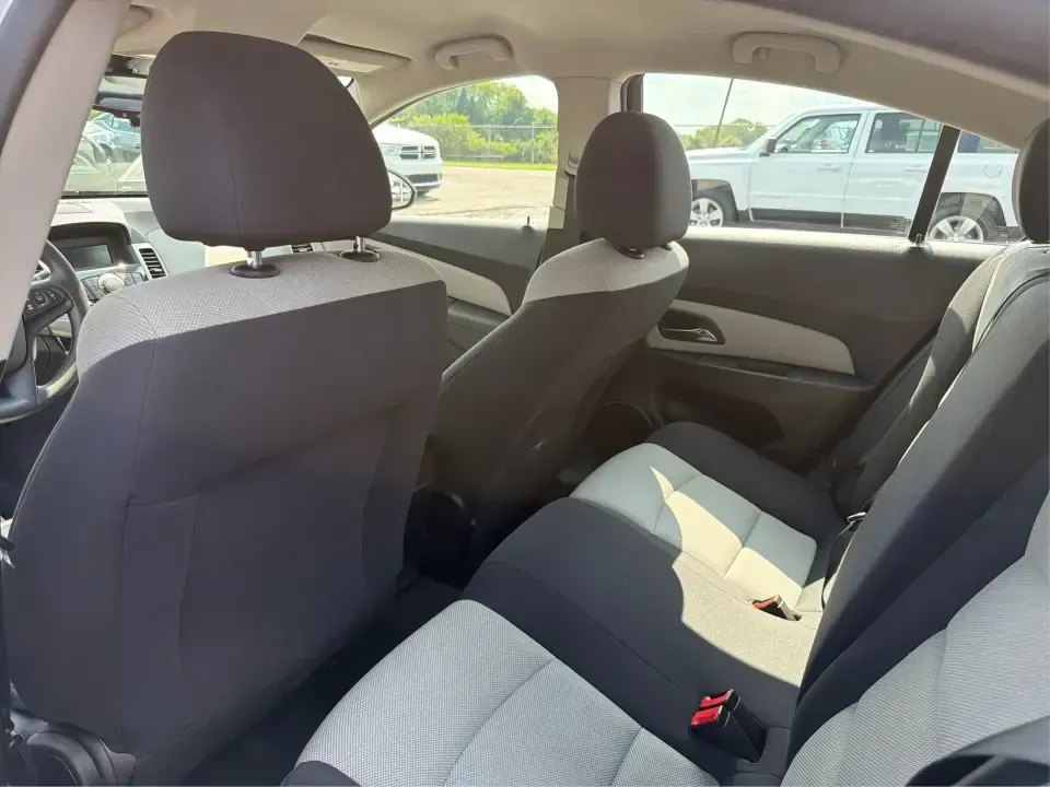 2015 Chevrolet Cruze LS Auto (1G1PA5SH8F7) with an 1.8L L4 DOHC 16V FFV engine, 6-Speed Automatic transmission, located at 1099 N County Rd 25A , Troy, OH, 45373, (937) 908-9800, 40.057079, -84.212883 - Need a smart, budget-friendly commuter that can handle the daily drive from Troy to Dayton, school drop-offs, and the occasional weekend run to The Greene or a day at Troy's Strawberry Festival? This 2015 Chevrolet Cruze LS Auto is built for real life-easy to park downtown near the Square, efficient- Photo#10