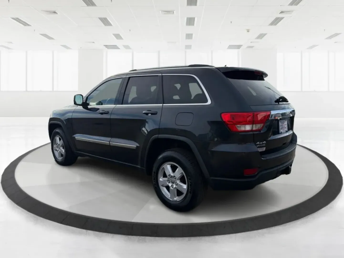 2012 Jeep Grand Cherokee Laredo (1C4RJFAG0CC) with an Other engine, located at 1099 N County Rd 25A , Troy, OH, 45373, (937) 908-9800, 40.057079, -84.212883 - **Adventure Awaits: Explore the Open Road in a 2012 Jeep Grand Cherokee Laredo!**<br /> <br /> If you're a weekend warrior or a growing family looking for your next adventure, this 2012 Jeep Grand Cherokee Laredo is the perfect fit for you! With its robust 4WD capabilities and spacious interior, you - Photo#4