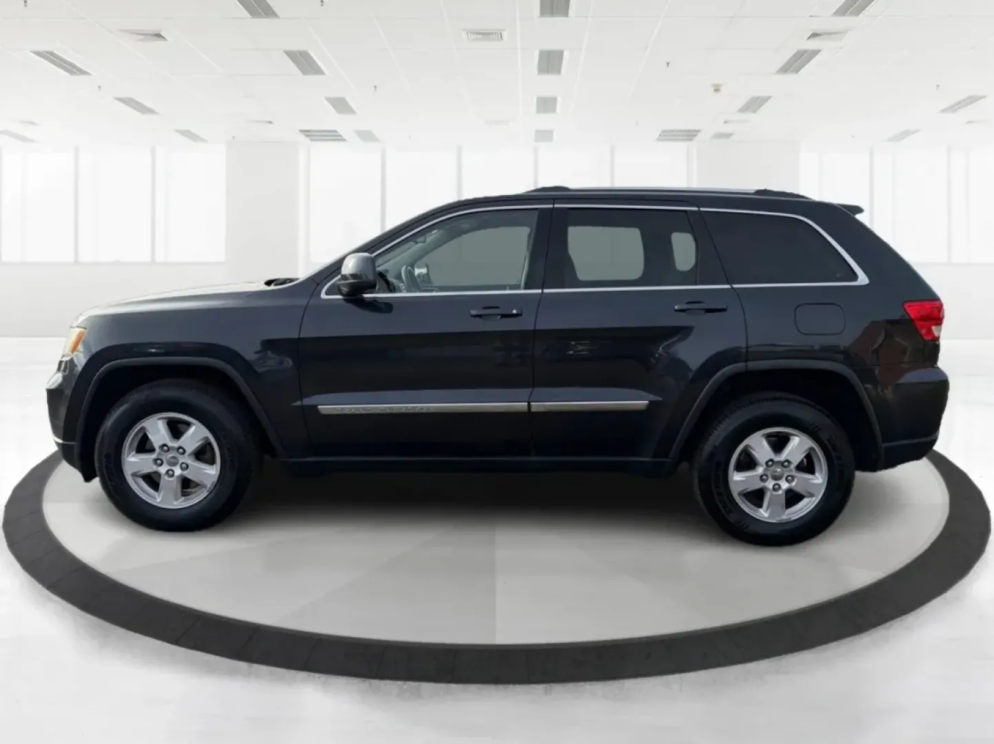2012 Jeep Grand Cherokee Laredo (1C4RJFAG0CC) with an Other engine, located at 1099 N County Rd 25A , Troy, OH, 45373, (937) 908-9800, 40.057079, -84.212883 - **Adventure Awaits: Explore the Open Road in a 2012 Jeep Grand Cherokee Laredo!**<br /> <br /> If you're a weekend warrior or a growing family looking for your next adventure, this 2012 Jeep Grand Cherokee Laredo is the perfect fit for you! With its robust 4WD capabilities and spacious interior, you - Photo#5
