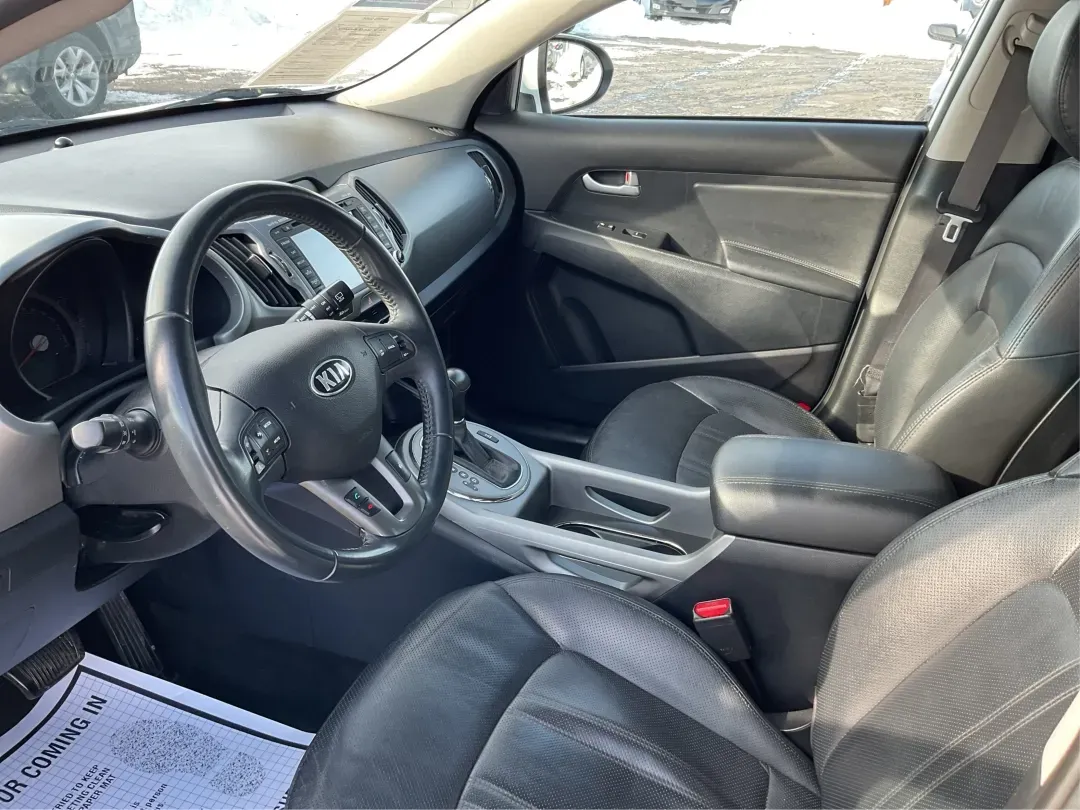 2016 Kia Sportage EX (KNDPCCAC2G7) with an Theta II 2.4L I-4 gasoline direct injection engine, located at 8750 N County Rd 25A, Piqua, OH, 45356, (937) 908-9800, 40.164391, -84.232513 - 2016 Kia Sportage EX - Photo#9