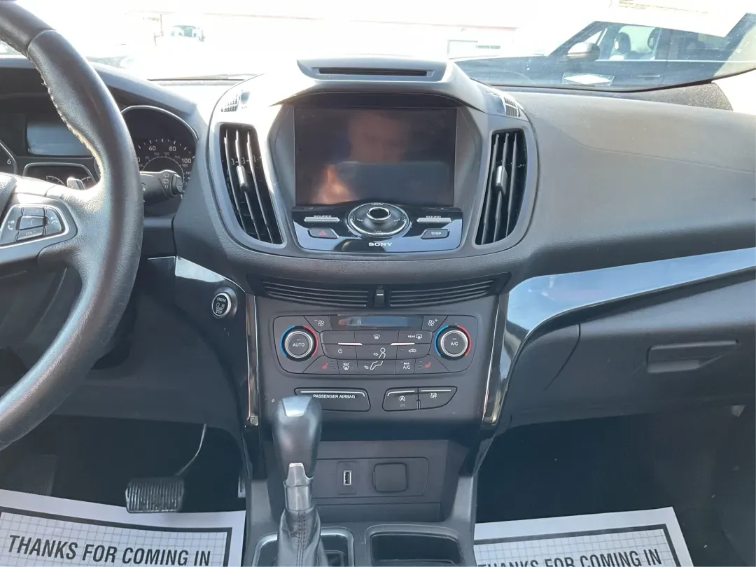 2017 Ford Escape Titanium (1FMCU0J90HU) with an Other engine, located at 4508 South Dixie Dr, Moraine, OH, 45439, (937) 908-9800, 39.689976, -84.218452 - **Adventure Awaits with the 2017 Ford Escape Titanium Perfect for Family Road Trips!**<br /> <br /> Are you ready to elevate your family adventures or daily commutes? Look no further than the 2017 Ford Escape Titanium, a sport utility vehicle designed for those who crave comfort, style, and functio - Photo#13