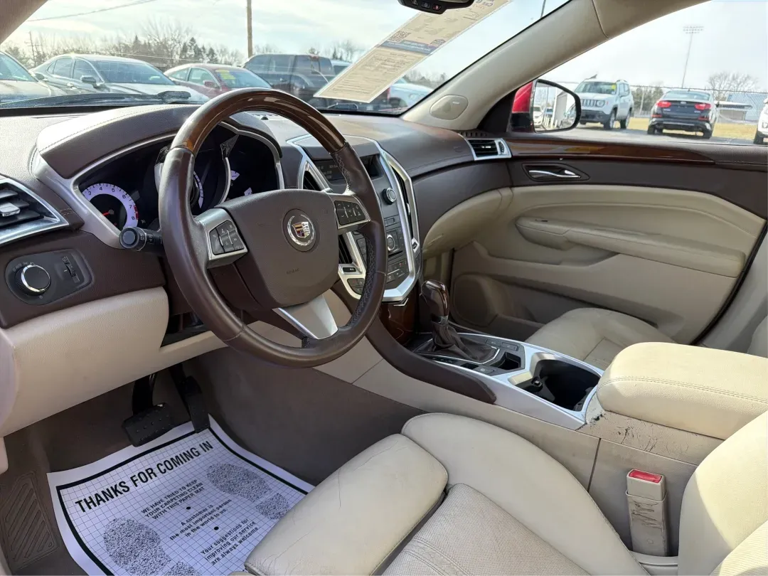 2011 Cadillac SRX Luxury Collection (3GYFNAEY4BS) with an Ecotec 3L V-6 gasoline direct injection engine, located at 401 Woodman Dr, Riverside, OH, 45431, (937) 908-9800, 39.760899, -84.123421 - 2011 Cadillac SRX Luxury Collection - Photo#9