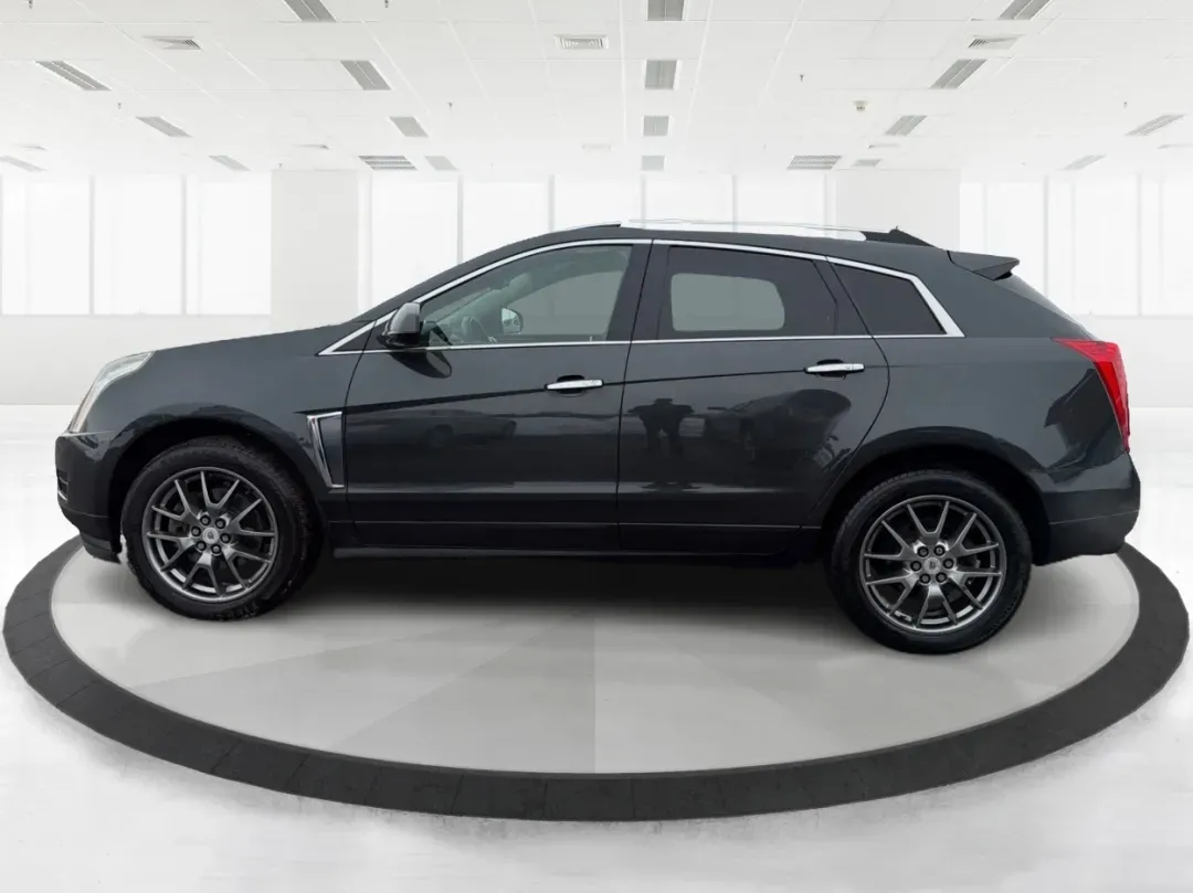 2014 Cadillac SRX Luxury Collection (3GYFNEE33ES) with an 3.6L V-6 gasoline direct injection engine, located at 1184 Kauffman Ave, Fairborn, OH, 45324, (937) 908-9800, 39.807072, -84.030914 - 2014 Cadillac SRX Luxury Collection - Photo#5