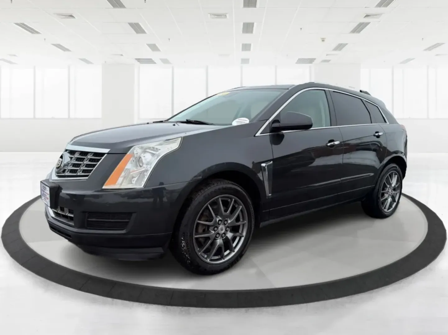 2014 Cadillac SRX Luxury Collection (3GYFNEE33ES) with an 3.6L V-6 gasoline direct injection engine, located at 1184 Kauffman Ave, Fairborn, OH, 45324, (937) 908-9800, 39.807072, -84.030914 - **Discover the Perfect Adventure Companion: 2014 Cadillac SRX Luxury Collection at Advantage Car and Credit - Fairborn**<br /> <br /> Are you ready to elevate your driving experience? Whether you're navigating the bustling streets of Fairborn, embarking on a weekend getaway, or transporting the kids - Photo#8