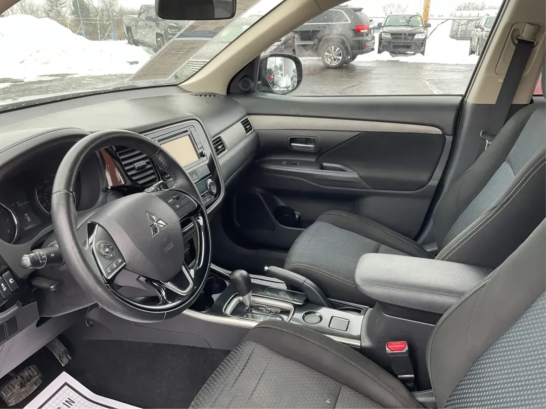 2017 Mitsubishi Outlander ES (JA4AD2A35HZ) with an 2.4L I-4 variable valve control engine, located at 1184 Kauffman Ave, Fairborn, OH, 45324, (937) 908-9800, 39.807072, -84.030914 - 2017 Mitsubishi Outlander ES - Photo#9