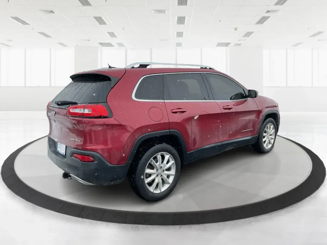 2015 Jeep Cherokee Limited (1C4PJMDS8FW) with an 3.2L V6 DOHC 24V engine, 9-Speed Automatic transmission, located at 1184 Kauffman Ave, Fairborn, OH, 45324, (937) 908-9800, 39.807072, -84.030914 - Need a dependable SUV that can handle Ohio weather, busy commutes, and spontaneous weekend escapes without draining your budget? This 2015 Jeep Cherokee Limited 4WD in Deep Cherry Red Crystal Pearlcoat is built for real life in Fairborn-whether you're shuttling kids to activities, commuting toward W - Photo#2