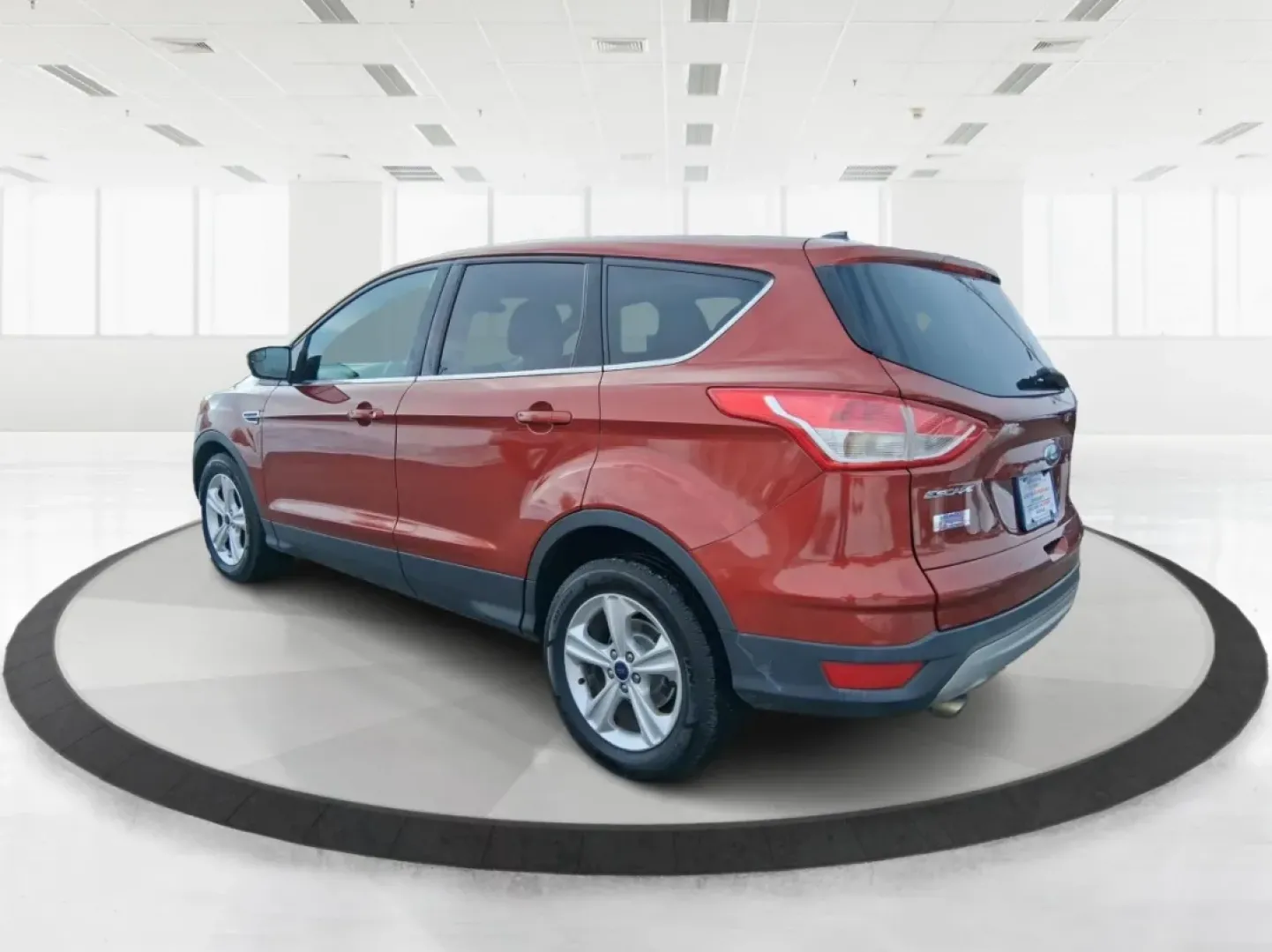 2016 Ford Escape SE (1FMCU0G71GU) with an 2.5L L4 DOHC 16V engine, 6-Speed Automatic transmission, located at 401 Woodman Dr, Riverside, OH, 45431, (937) 908-9800, 39.760899, -84.123421 - Need an SUV that can handle school drop-offs, I675 commutes, and spontaneous weekend getaways to Carillon Historical Park or a day at the National Museum of the U.S. Air Force? This 2016 Ford Escape SE in eye-catching Sunset is built for real-life schedules-easy to park, comfortable for longer drive - Photo#3