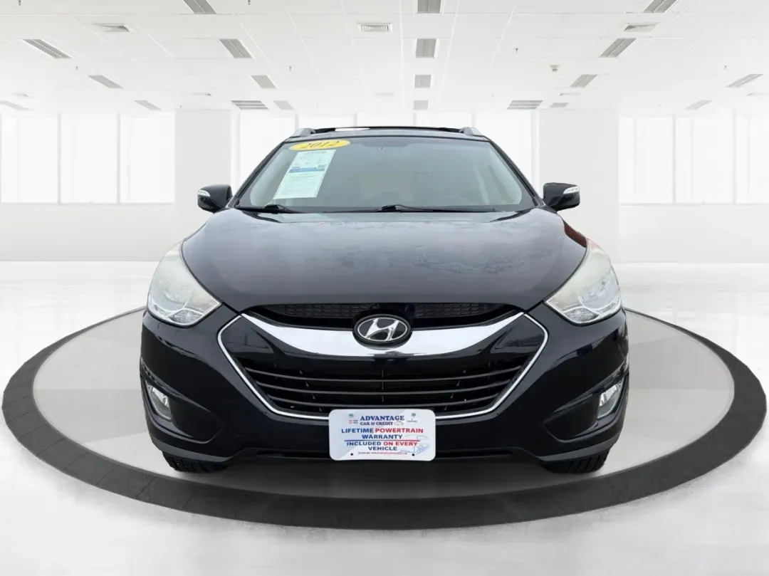2012 Hyundai Tucson Limited (KM8JU3AC5CU) with an Theta II 2.4L I-4 DOHC engine, 6-Speed Automatic transmission, located at 880 E. National Road, Vandalia, OH, 45377, (937) 908-9800, 39.891918, -84.183594 - Need a dependable SUV that fits real life-school drop-offs, I-75 commuting, and weekend getaways to Taylorsville MetroPark-without the stress of traditional bank rules? This 2012 Hyundai Tucson Limited in Ash Black is a smart, comfortable choice for Vandalia drivers who want a practical daily vehicl - Photo#7