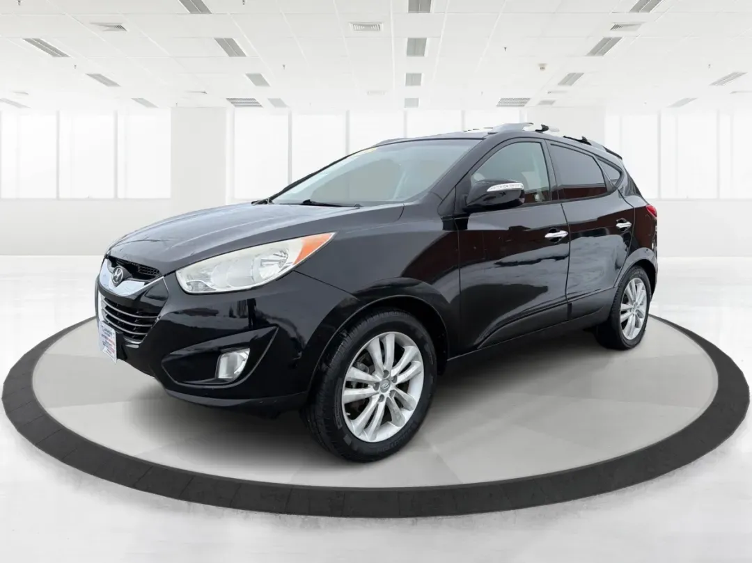 2012 Hyundai Tucson Limited (KM8JU3AC5CU) with an Theta II 2.4L I-4 DOHC engine, 6-Speed Automatic transmission, located at 880 E. National Road, Vandalia, OH, 45377, (937) 908-9800, 39.891918, -84.183594 - Need a dependable SUV that fits real life-school drop-offs, I-75 commuting, and weekend getaways to Taylorsville MetroPark-without the stress of traditional bank rules? This 2012 Hyundai Tucson Limited in Ash Black is a smart, comfortable choice for Vandalia drivers who want a practical daily vehicl - Photo#8