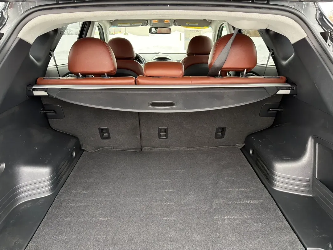 2012 Hyundai Tucson Limited (KM8JU3AC5CU) with an Theta II 2.4L I-4 DOHC engine, 6-Speed Automatic transmission, located at 880 E. National Road, Vandalia, OH, 45377, (937) 908-9800, 39.891918, -84.183594 - Need a dependable SUV that fits real life-school drop-offs, I-75 commuting, and weekend getaways to Taylorsville MetroPark-without the stress of traditional bank rules? This 2012 Hyundai Tucson Limited in Ash Black is a smart, comfortable choice for Vandalia drivers who want a practical daily vehicl - Photo#12