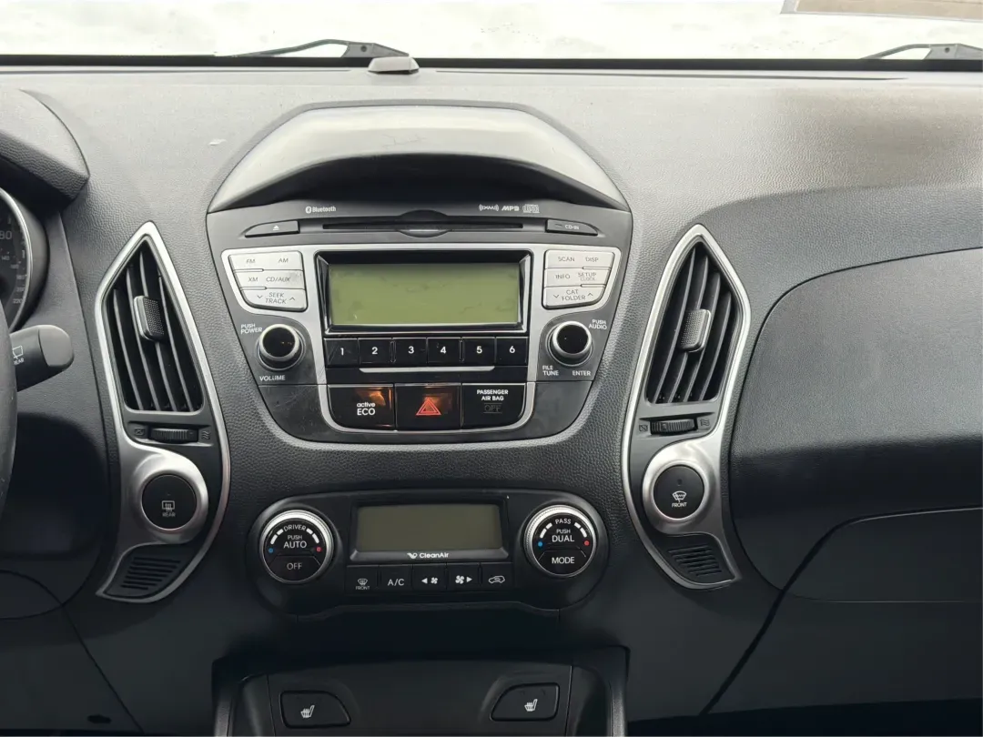 2012 Hyundai Tucson Limited (KM8JU3AC5CU) with an Theta II 2.4L I-4 DOHC engine, 6-Speed Automatic transmission, located at 880 E. National Road, Vandalia, OH, 45377, (937) 908-9800, 39.891918, -84.183594 - Need a dependable SUV that fits real life-school drop-offs, I-75 commuting, and weekend getaways to Taylorsville MetroPark-without the stress of traditional bank rules? This 2012 Hyundai Tucson Limited in Ash Black is a smart, comfortable choice for Vandalia drivers who want a practical daily vehicl - Photo#13