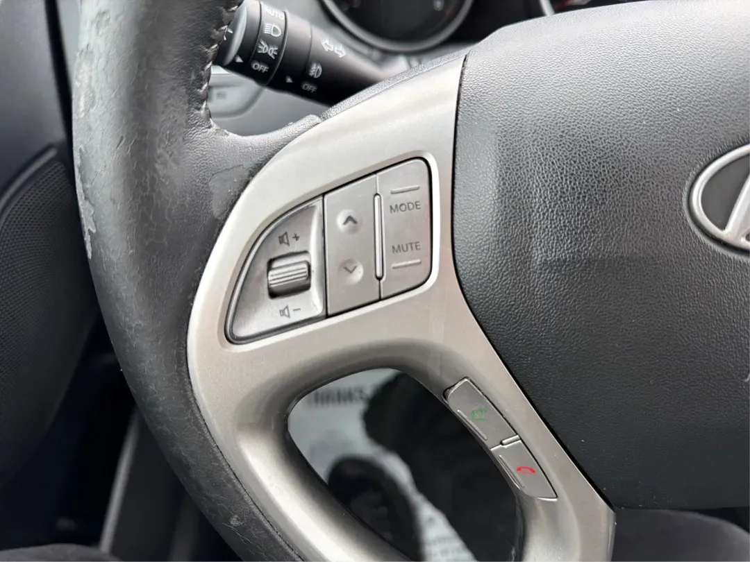 2012 Hyundai Tucson Limited (KM8JU3AC5CU) with an Theta II 2.4L I-4 DOHC engine, 6-Speed Automatic transmission, located at 880 E. National Road, Vandalia, OH, 45377, (937) 908-9800, 39.891918, -84.183594 - Need a dependable SUV that fits real life-school drop-offs, I-75 commuting, and weekend getaways to Taylorsville MetroPark-without the stress of traditional bank rules? This 2012 Hyundai Tucson Limited in Ash Black is a smart, comfortable choice for Vandalia drivers who want a practical daily vehicl - Photo#16