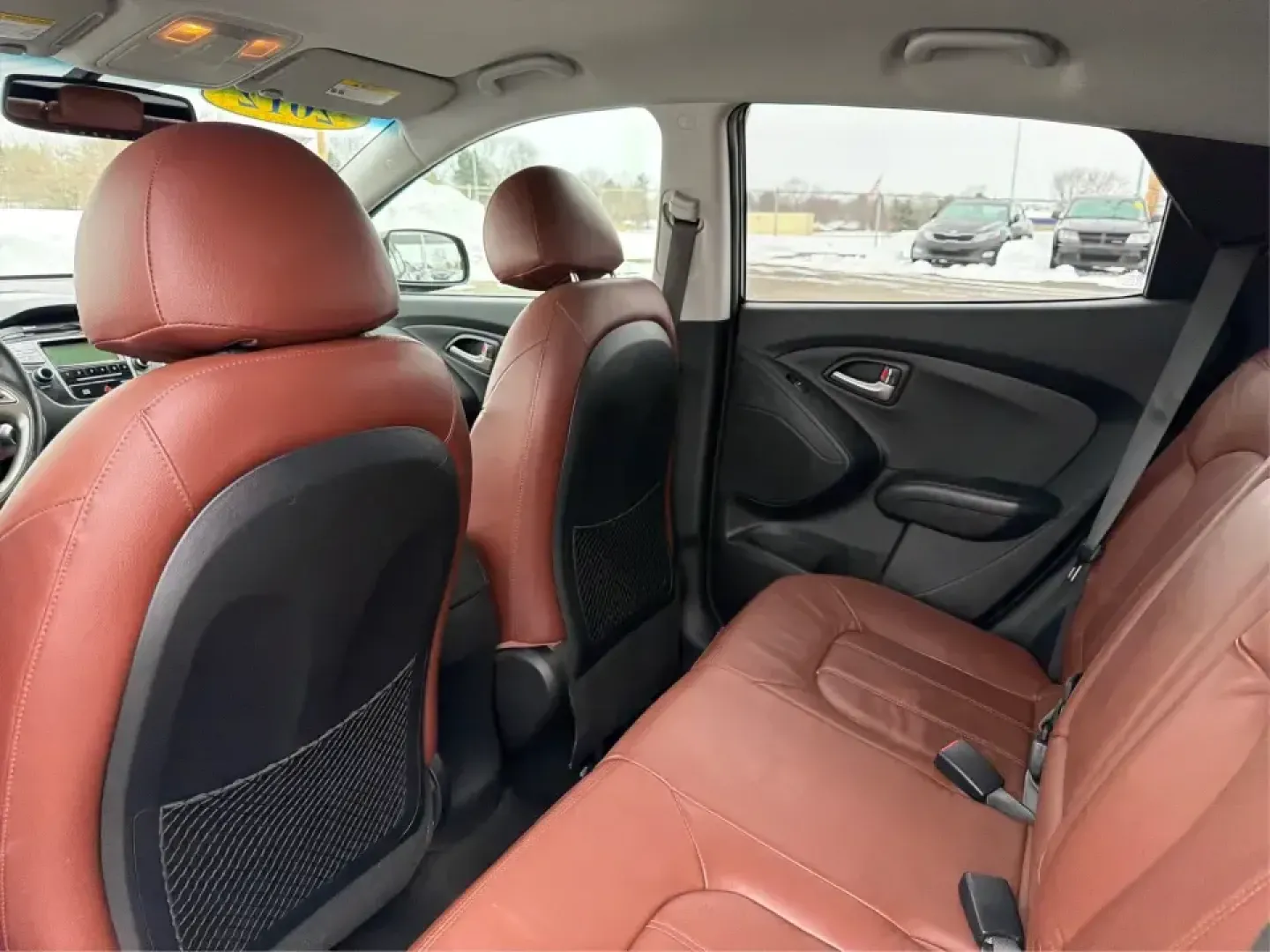 2012 Hyundai Tucson Limited (KM8JU3AC5CU) with an Theta II 2.4L I-4 DOHC engine, 6-Speed Automatic transmission, located at 880 E. National Road, Vandalia, OH, 45377, (937) 908-9800, 39.891918, -84.183594 - Need a dependable SUV that fits real life-school drop-offs, I-75 commuting, and weekend getaways to Taylorsville MetroPark-without the stress of traditional bank rules? This 2012 Hyundai Tucson Limited in Ash Black is a smart, comfortable choice for Vandalia drivers who want a practical daily vehicl - Photo#10