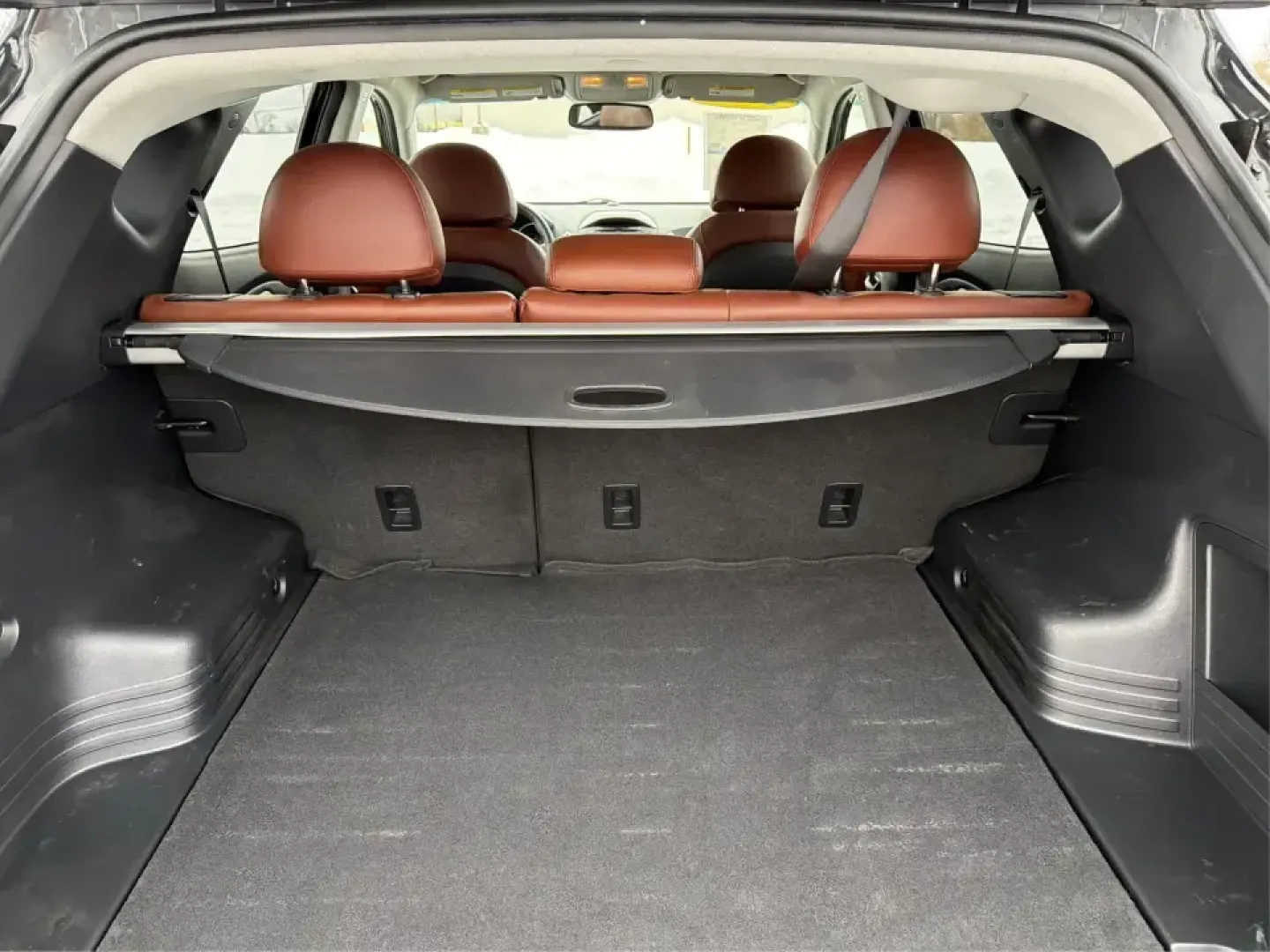 2012 Hyundai Tucson Limited (KM8JU3AC5CU) with an Theta II 2.4L I-4 DOHC engine, 6-Speed Automatic transmission, located at 880 E. National Road, Vandalia, OH, 45377, (937) 908-9800, 39.891918, -84.183594 - Need a dependable SUV that fits real life-school drop-offs, I-75 commuting, and weekend getaways to Taylorsville MetroPark-without the stress of traditional bank rules? This 2012 Hyundai Tucson Limited in Ash Black is a smart, comfortable choice for Vandalia drivers who want a practical daily vehicl - Photo#12