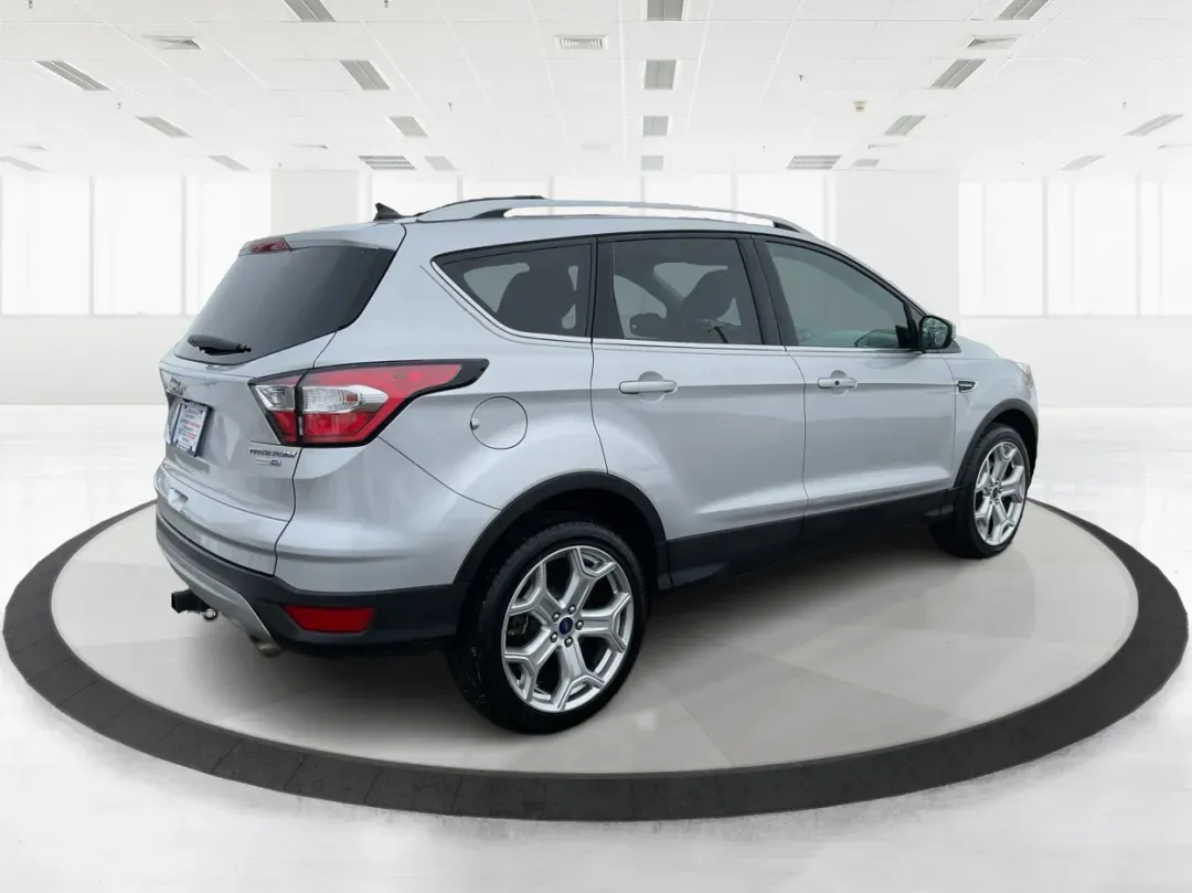 2018 Ford Escape Titanium (1FMCU9J97JU) with an EcoBoost 2L I-4 gasoline direct injection engine, 6A transmission, located at 1099 N County Rd 25A , Troy, OH, 45373, (937) 908-9800, 40.057079, -84.212883 - Need an SUV that can handle Ohio weather, daily commutes, and weekend getaways without feeling like a compromise? This 2018 Ford Escape Titanium 4WD in Ingot Silver Metallic is built for real life in Troy-whether you're shuttling kids across town, driving a long commute down I-75, or loading up for - Photo#2