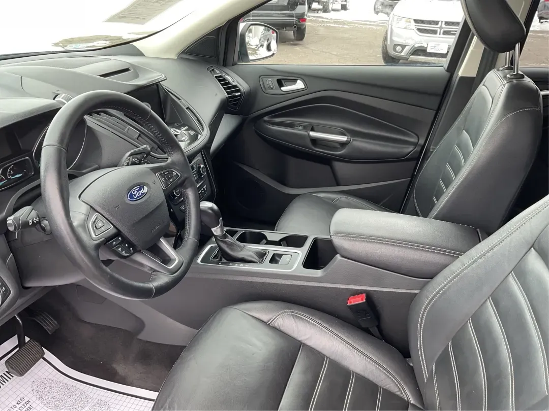 2018 Ford Escape Titanium (1FMCU9J97JU) with an EcoBoost 2L I-4 gasoline direct injection engine, 6A transmission, located at 1099 N County Rd 25A , Troy, OH, 45373, (937) 908-9800, 40.057079, -84.212883 - Need an SUV that can handle Ohio weather, daily commutes, and weekend getaways without feeling like a compromise? This 2018 Ford Escape Titanium 4WD in Ingot Silver Metallic is built for real life in Troy-whether you're shuttling kids across town, driving a long commute down I-75, or loading up for - Photo#9