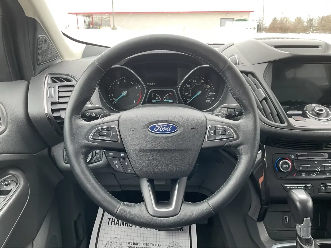 2018 Ford Escape Titanium (1FMCU9J97JU) with an EcoBoost 2L I-4 gasoline direct injection engine, 6A transmission, located at 1099 N County Rd 25A , Troy, OH, 45373, (937) 908-9800, 40.057079, -84.212883 - Need an SUV that can handle Ohio weather, daily commutes, and weekend getaways without feeling like a compromise? This 2018 Ford Escape Titanium 4WD in Ingot Silver Metallic is built for real life in Troy-whether you're shuttling kids across town, driving a long commute down I-75, or loading up for - Photo#16