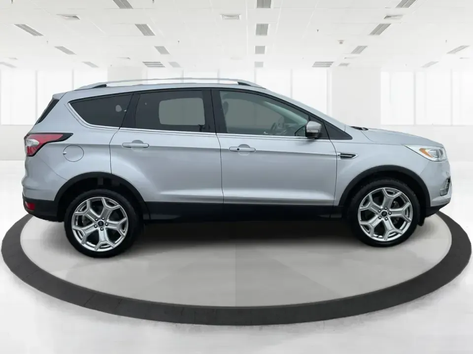 2018 Ford Escape Titanium (1FMCU9J97JU) with an EcoBoost 2L I-4 gasoline direct injection engine, 6A transmission, located at 8750 N County Rd 25A, Piqua, OH, 45356, (937) 908-9800, 40.164391, -84.232513 - Need an SUV that can handle Ohio weather, daily commutes, and weekend getaways without feeling like a compromise? This 2018 Ford Escape Titanium 4WD in Ingot Silver Metallic is built for real life in Troy-whether you're shuttling kids across town, driving a long commute down I-75, or loading up for - Photo#1