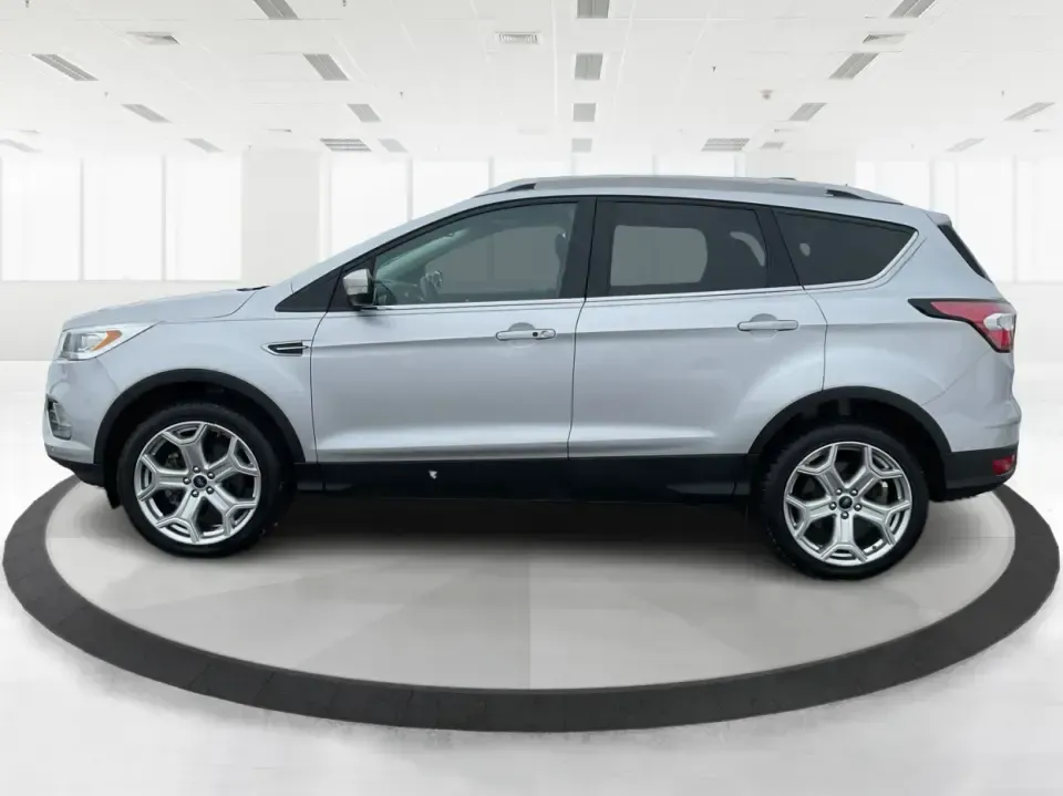 2018 Ford Escape Titanium (1FMCU9J97JU) with an EcoBoost 2L I-4 gasoline direct injection engine, 6A transmission, located at 8750 N County Rd 25A, Piqua, OH, 45356, (937) 908-9800, 40.164391, -84.232513 - Need an SUV that can handle Ohio weather, daily commutes, and weekend getaways without feeling like a compromise? This 2018 Ford Escape Titanium 4WD in Ingot Silver Metallic is built for real life in Troy-whether you're shuttling kids across town, driving a long commute down I-75, or loading up for - Photo#5