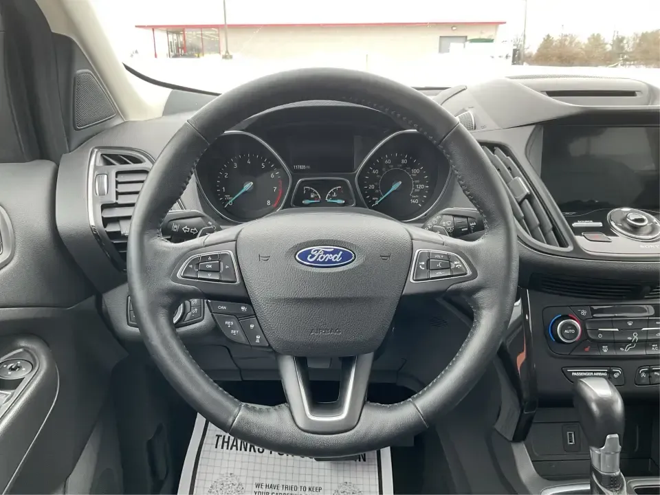 2018 Ford Escape Titanium (1FMCU9J97JU) with an EcoBoost 2L I-4 gasoline direct injection engine, 6A transmission, located at 8750 N County Rd 25A, Piqua, OH, 45356, (937) 908-9800, 40.164391, -84.232513 - Need an SUV that can handle Ohio weather, daily commutes, and weekend getaways without feeling like a compromise? This 2018 Ford Escape Titanium 4WD in Ingot Silver Metallic is built for real life in Troy-whether you're shuttling kids across town, driving a long commute down I-75, or loading up for - Photo#16