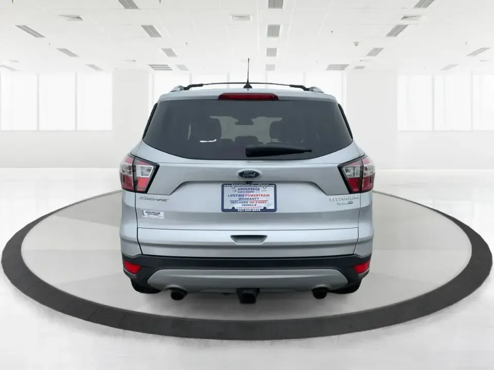 2018 Ford Escape Titanium (1FMCU9J97JU) with an EcoBoost 2L I-4 gasoline direct injection engine, 6A transmission, located at 1230 East Main St, Xenia, OH, 45385, (937) 908-9800, 39.688026, -83.910172 - Need an SUV that can handle Ohio weather, daily commutes, and weekend getaways without feeling like a compromise? This 2018 Ford Escape Titanium 4WD in Ingot Silver Metallic is built for real life in Troy-whether you're shuttling kids across town, driving a long commute down I-75, or loading up for - Photo#3
