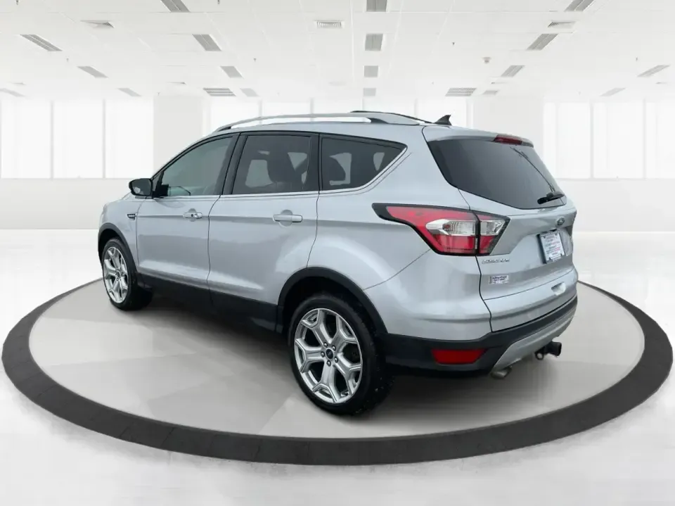 2018 Ford Escape Titanium (1FMCU9J97JU) with an EcoBoost 2L I-4 gasoline direct injection engine, 6A transmission, located at 1230 East Main St, Xenia, OH, 45385, (937) 908-9800, 39.688026, -83.910172 - Need an SUV that can handle Ohio weather, daily commutes, and weekend getaways without feeling like a compromise? This 2018 Ford Escape Titanium 4WD in Ingot Silver Metallic is built for real life in Troy-whether you're shuttling kids across town, driving a long commute down I-75, or loading up for - Photo#4