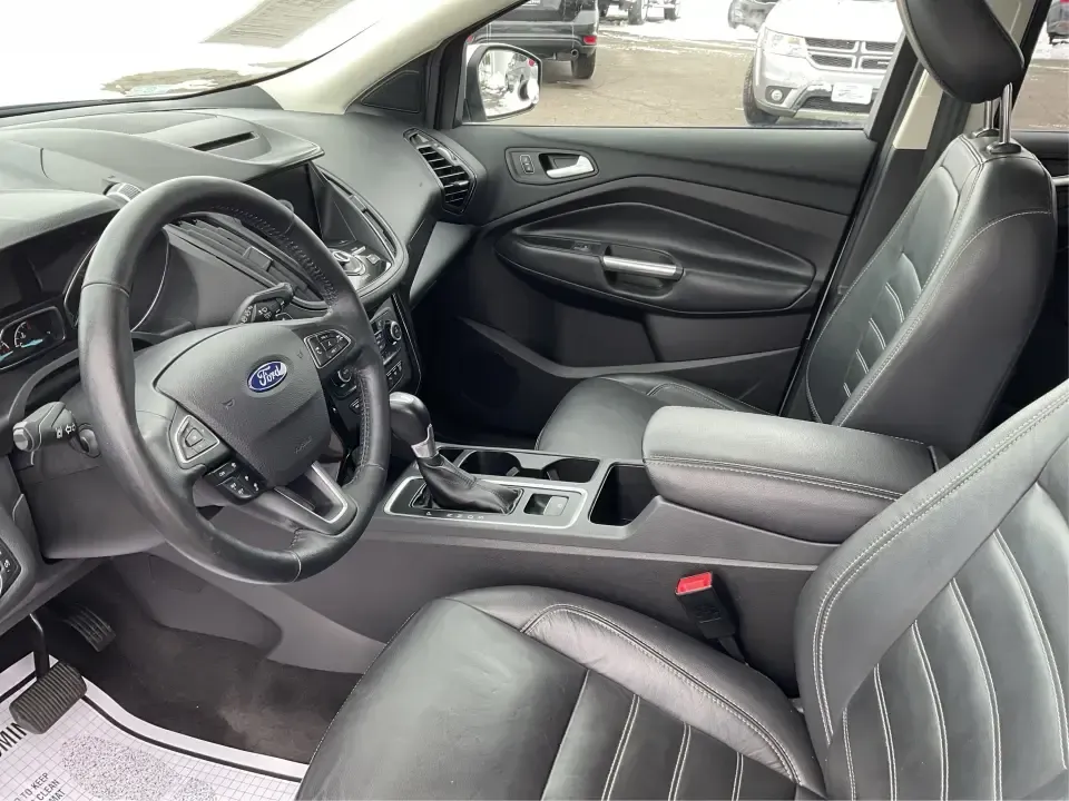 2018 Ford Escape Titanium (1FMCU9J97JU) with an EcoBoost 2L I-4 gasoline direct injection engine, 6A transmission, located at 1230 East Main St, Xenia, OH, 45385, (937) 908-9800, 39.688026, -83.910172 - Need an SUV that can handle Ohio weather, daily commutes, and weekend getaways without feeling like a compromise? This 2018 Ford Escape Titanium 4WD in Ingot Silver Metallic is built for real life in Troy-whether you're shuttling kids across town, driving a long commute down I-75, or loading up for - Photo#9
