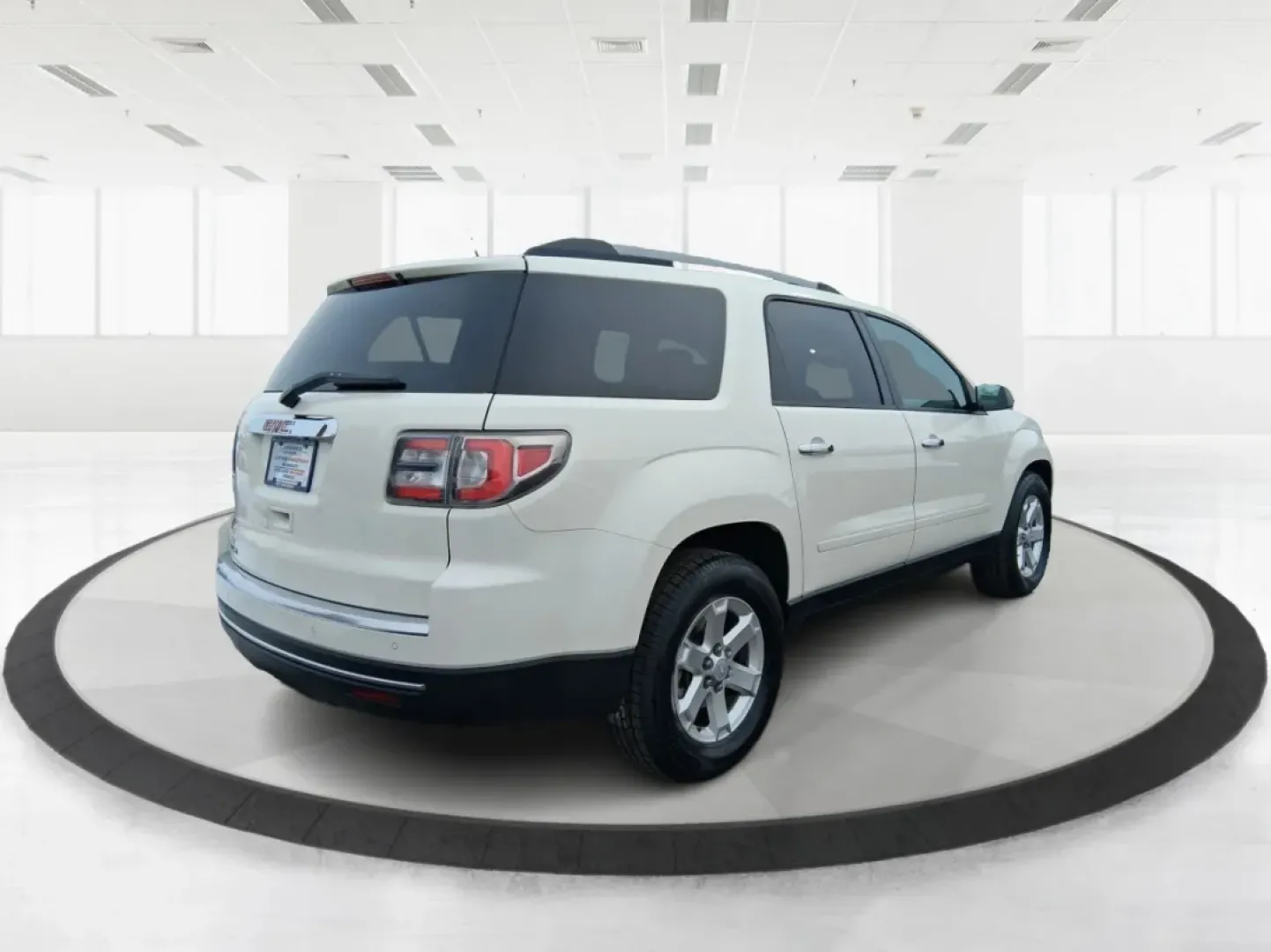 2015 GMC Acadia SLE-1 (1GKKRNED4FJ) with an 3.6L V-6 gasoline direct injection engine, 6-Speed Automatic transmission, located at 1184 Kauffman Ave, Fairborn, OH, 45324, (937) 908-9800, 39.807072, -84.030914 - If your week is a mix of school drop-offs, Wright-Patterson AFB commutes, and weekend getaways to Yellow Springs, this 2015 GMC Acadia SLE-1 is the kind of SUV that fits real life-roomy for passengers, practical for cargo, and comfortable enough for long stretches on I-675 or US-35.<br /> <br /> Ava - Photo#2