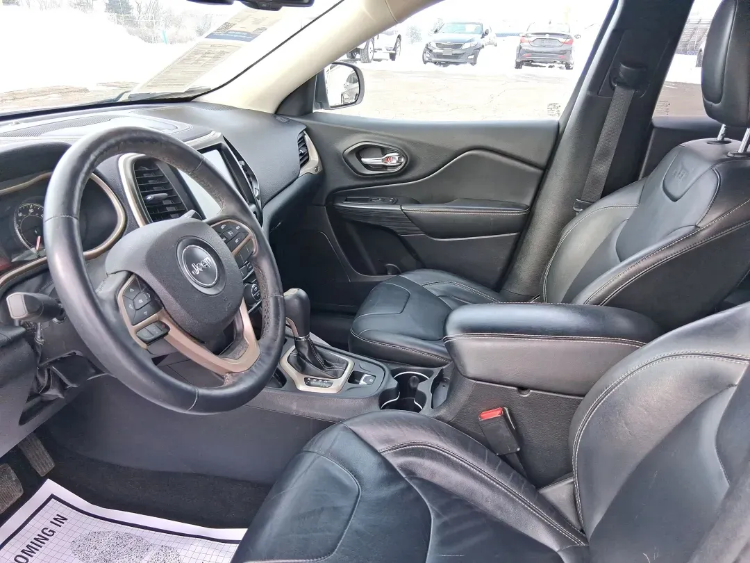 2014 Jeep Cherokee Limited (1C4PJLDB5EW) with an 2.4L L4 DOHC 16V engine, 9-Speed Automatic transmission, located at 401 Woodman Dr, Riverside, OH, 45431, (937) 908-9800, 39.760899, -84.123421 - Picture your next Ohio weekend: loading up the cooler, pointing the hood toward Eastwood MetroPark, and cruising I-675 or US35 with room for friends, gear, and comfort. This 2014 Jeep Cherokee Limited is the kind of crossover that fits real life in Riverside-school runs, long commutes to Wright-Patt - Photo#9