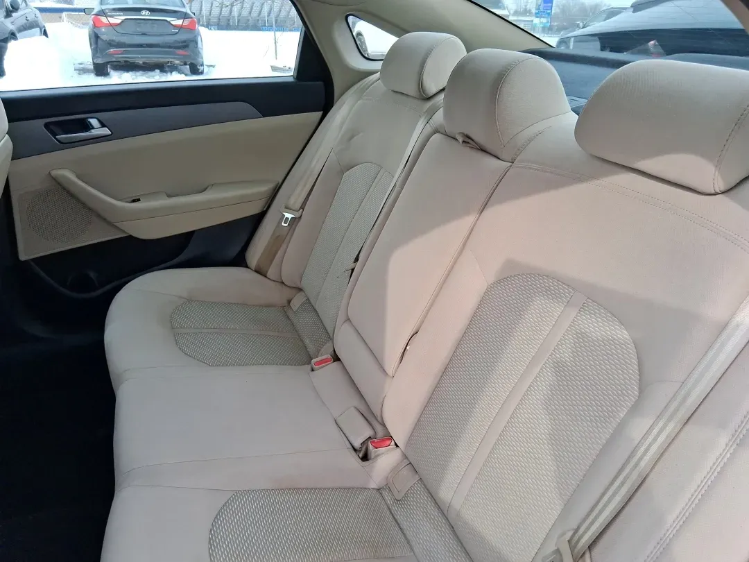 2016 Hyundai Sonata SE (5NPE24AF9GH) with an 2.4L I-4 gasoline direct injection engine, 7A transmission, located at 880 E. National Road, Vandalia, OH, 45377, (937) 908-9800, 39.891918, -84.183594 - Need a dependable daily driver that can handle the school run, the I-75 commute, and the occasional weekend getaway without draining your budget? This 2016 Hyundai Sonata SE in rich Dark Truffle is the kind of comfortable, efficient sedan that fits real life in Vandalia-easy to park, smooth on longe - Photo#10