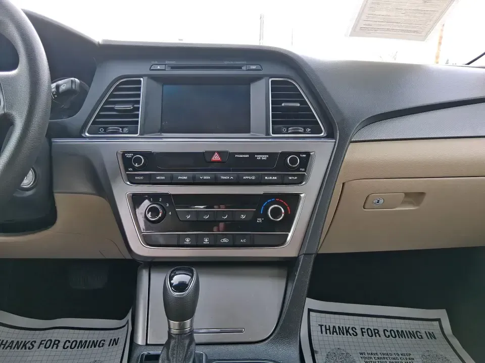 2016 Hyundai Sonata SE (5NPE24AF9GH) with an 2.4L I-4 gasoline direct injection engine, 7A transmission, located at 401 Woodman Dr, Riverside, OH, 45431, (937) 908-9800, 39.760899, -84.123421 - Need a dependable daily driver that can handle the school run, the I-75 commute, and the occasional weekend getaway without draining your budget? This 2016 Hyundai Sonata SE in rich Dark Truffle is the kind of comfortable, efficient sedan that fits real life in Vandalia-easy to park, smooth on longe - Photo#13