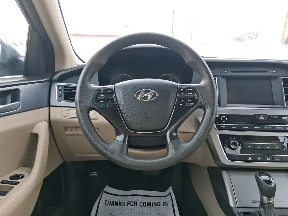 2016 Hyundai Sonata SE (5NPE24AF9GH) with an 2.4L I-4 gasoline direct injection engine, 7A transmission, located at 401 Woodman Dr, Riverside, OH, 45431, (937) 908-9800, 39.760899, -84.123421 - Need a dependable daily driver that can handle the school run, the I-75 commute, and the occasional weekend getaway without draining your budget? This 2016 Hyundai Sonata SE in rich Dark Truffle is the kind of comfortable, efficient sedan that fits real life in Vandalia-easy to park, smooth on longe - Photo#16