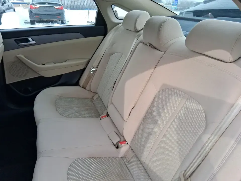 2016 Hyundai Sonata SE (5NPE24AF9GH) with an 2.4L I-4 gasoline direct injection engine, 7A transmission, located at 8750 N County Rd 25A, Piqua, OH, 45356, (937) 908-9800, 40.164391, -84.232513 - Need a dependable daily driver that can handle the school run, the I-75 commute, and the occasional weekend getaway without draining your budget? This 2016 Hyundai Sonata SE in rich Dark Truffle is the kind of comfortable, efficient sedan that fits real life in Vandalia-easy to park, smooth on longe - Photo#10