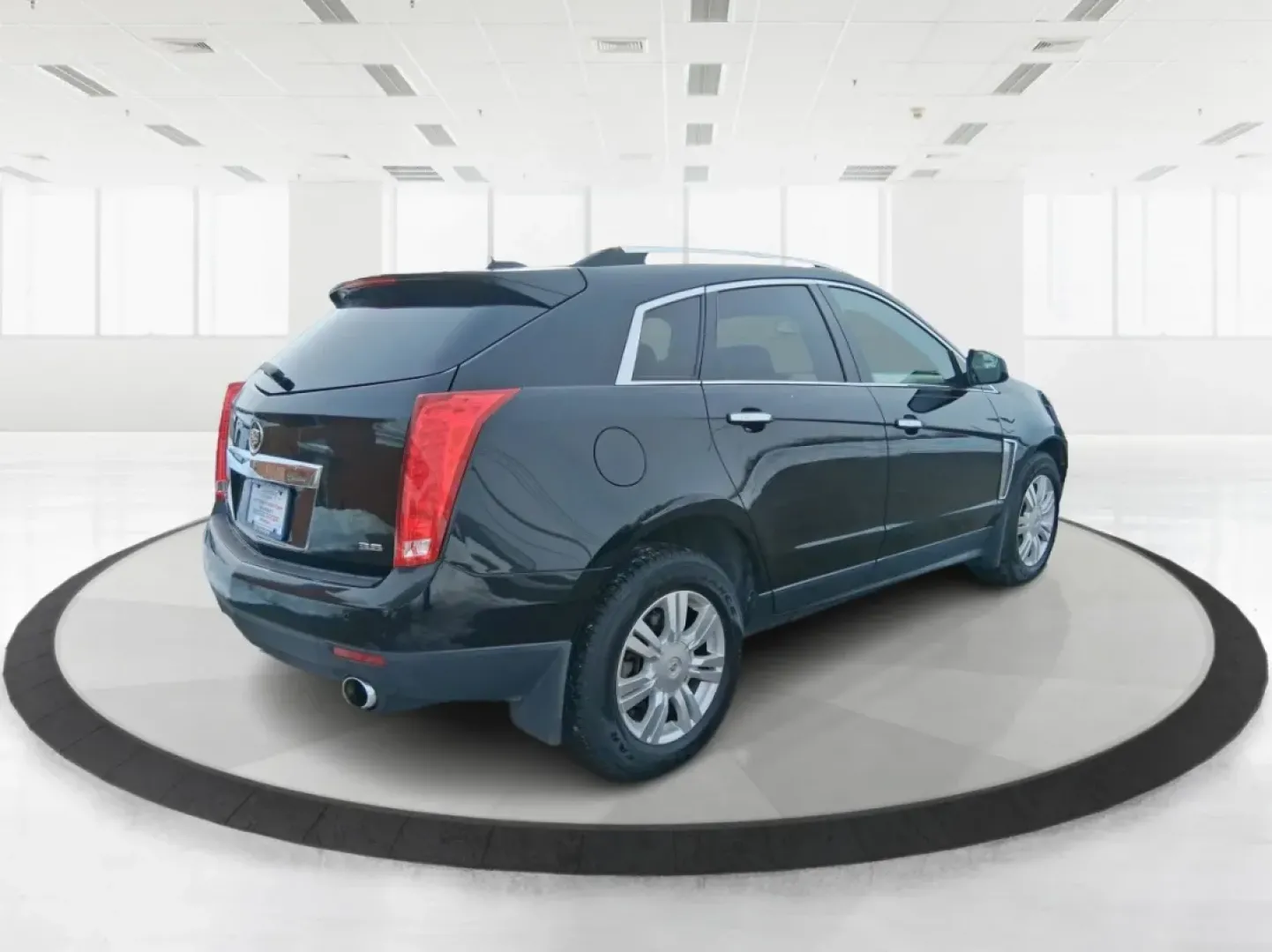 2016 Cadillac SRX Luxury Collection (3GYFNEE32GS) with an 3.6L V-6 gasoline direct injection engine, located at 1099 N County Rd 25A , Troy, OH, 45373, (937) 908-9800, 40.057079, -84.212883 - Picture your next road trip starting in Troy and rolling out past the Great Miami River Trail with everyone comfortable, connected, and confident-no cramped seats, no noisy ride, just smooth power and premium Cadillac style. This 2016 Cadillac SRX Luxury Collection is the kind of SUV that fits real - Photo#2
