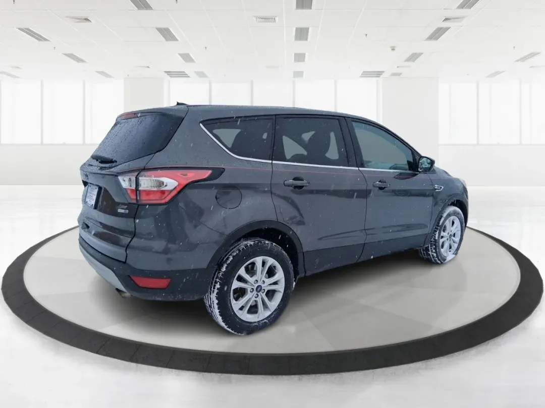 2017 Ford Escape SE (1FMCU9GD3HU) with an 1.5L L4 DOHC 16V engine, 6A transmission, located at 401 Woodman Dr, Riverside, OH, 45431, (937) 908-9800, 39.760899, -84.123421 - Need one SUV that can handle the weekday commute, school drop-offs, and a quick weekend escape to Eastwood MetroPark without blinking? This 2017 Ford Escape SE in Magnetic Metallic is built for real life in the Miami Valley-easy to park, confident in rough weather, and comfortable enough for long st - Photo#2