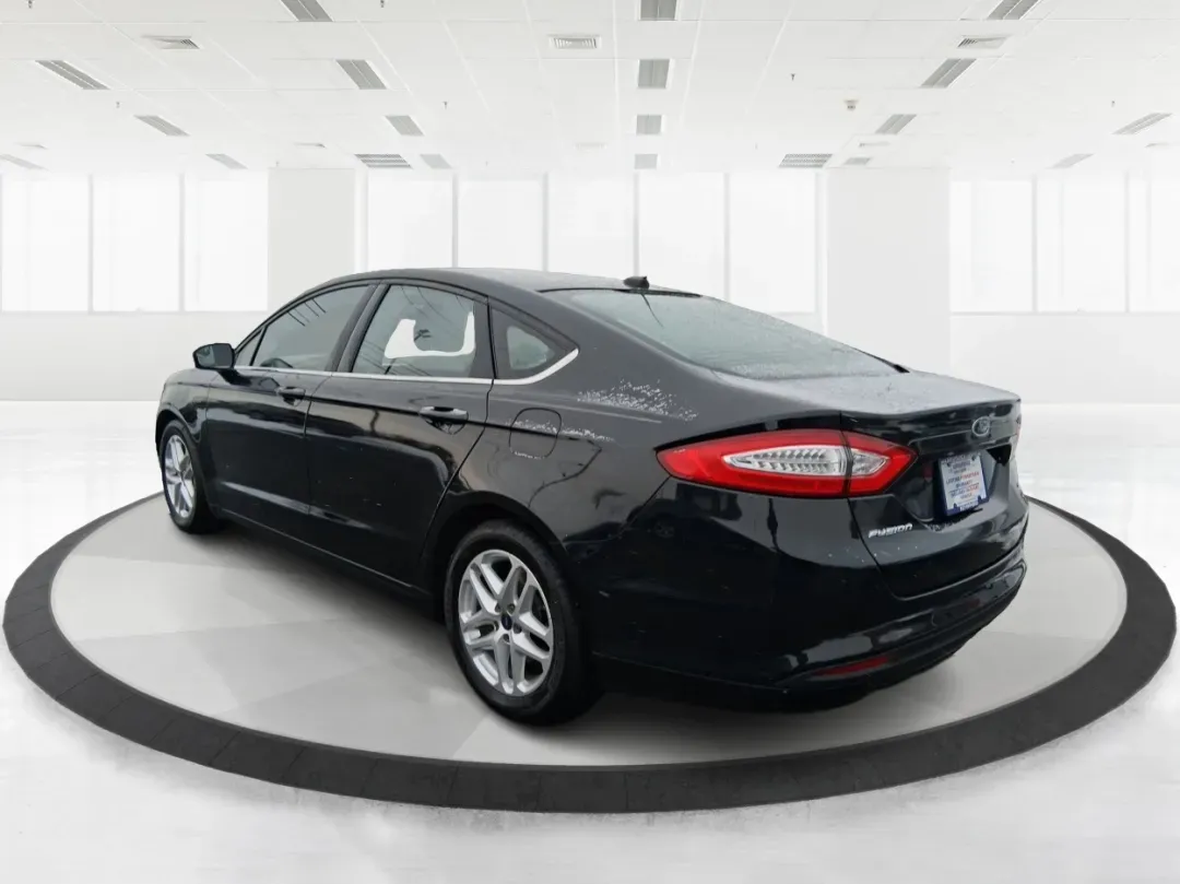 2014 Ford Fusion SE (1FA6P0H77E5) with an 2.5L L4 DOHC 16V engine, Automatic transmission, located at 880 E. National Road, Vandalia, OH, 45377, (937) 908-9800, 39.891918, -84.183594 - Need a dependable sedan for the daily commute up I75, school drop-offs around Vandalia-Butler City Schools, and comfortable weekend drives to the National Museum of the U.S. Air Force? This 2014 Ford Fusion SE is built for real life-smooth on longer stretches of E. National Road, easy to park for er - Photo#4