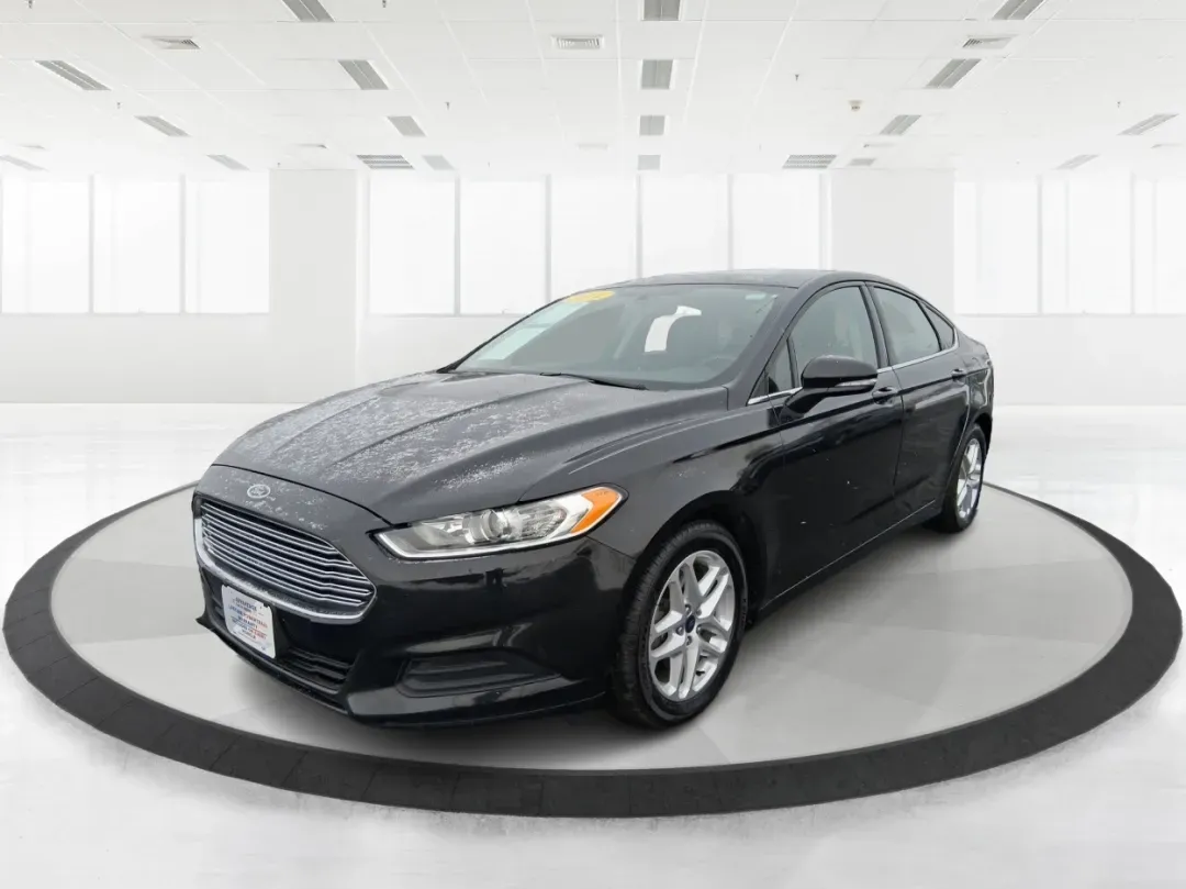 2014 Ford Fusion SE (1FA6P0H77E5) with an 2.5L L4 DOHC 16V engine, Automatic transmission, located at 880 E. National Road, Vandalia, OH, 45377, (937) 908-9800, 39.891918, -84.183594 - Need a dependable sedan for the daily commute up I75, school drop-offs around Vandalia-Butler City Schools, and comfortable weekend drives to the National Museum of the U.S. Air Force? This 2014 Ford Fusion SE is built for real life-smooth on longer stretches of E. National Road, easy to park for er - Photo#8